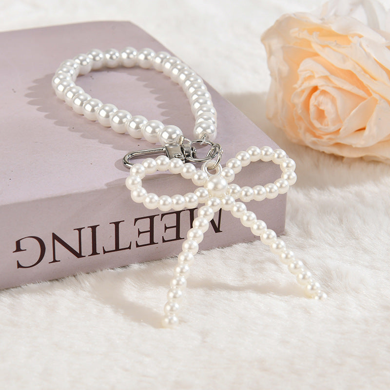 Wholesale Colorful bow cute little hat acrylic keychain