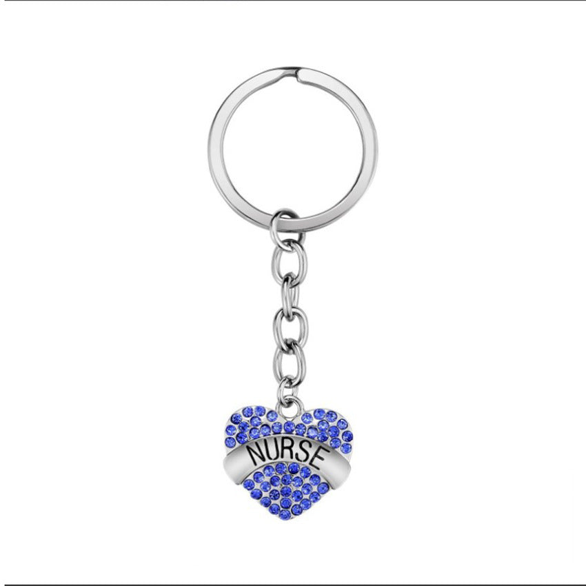 Keychains de diamantes de corazón geométrico de aleación de acero inoxidable al por mayor