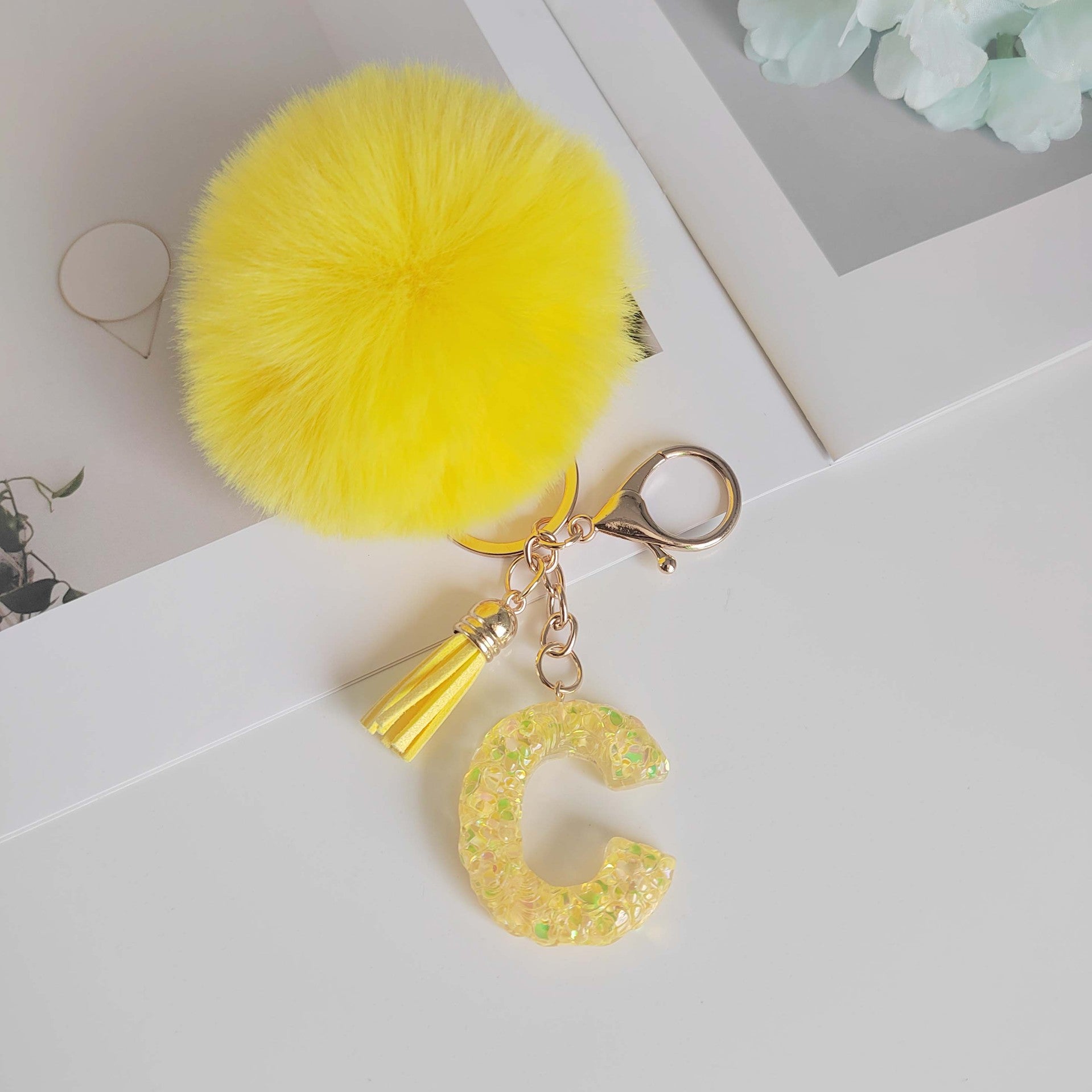 Wholesale Yellow letter ball pendant flower shaped letter keychain