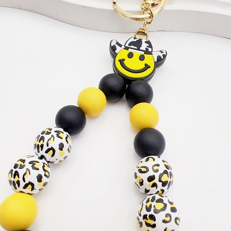 Wholesale Silicone Pumpkin Cow Ghost Dog Paw Wooden Bead Bracelet Keychain