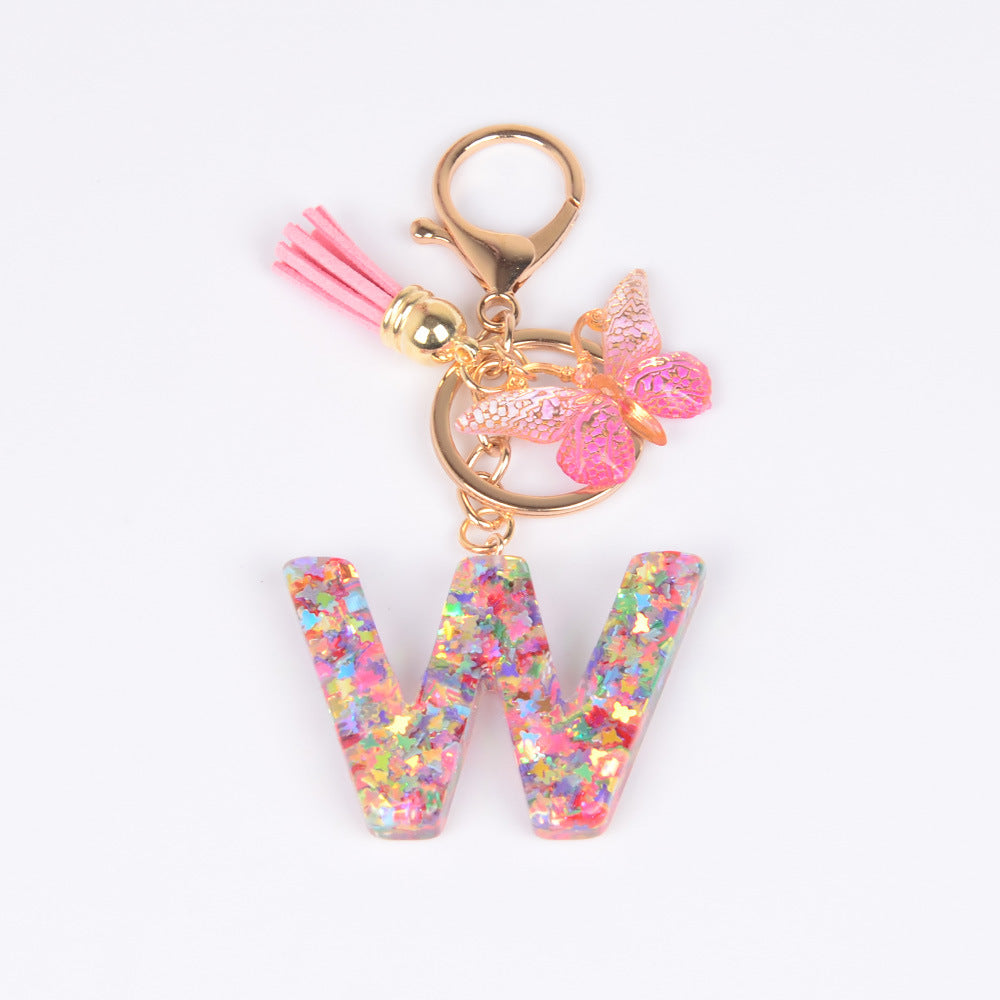 卸売スパンコール英語蝶タッセル文字樹脂キーホルダー