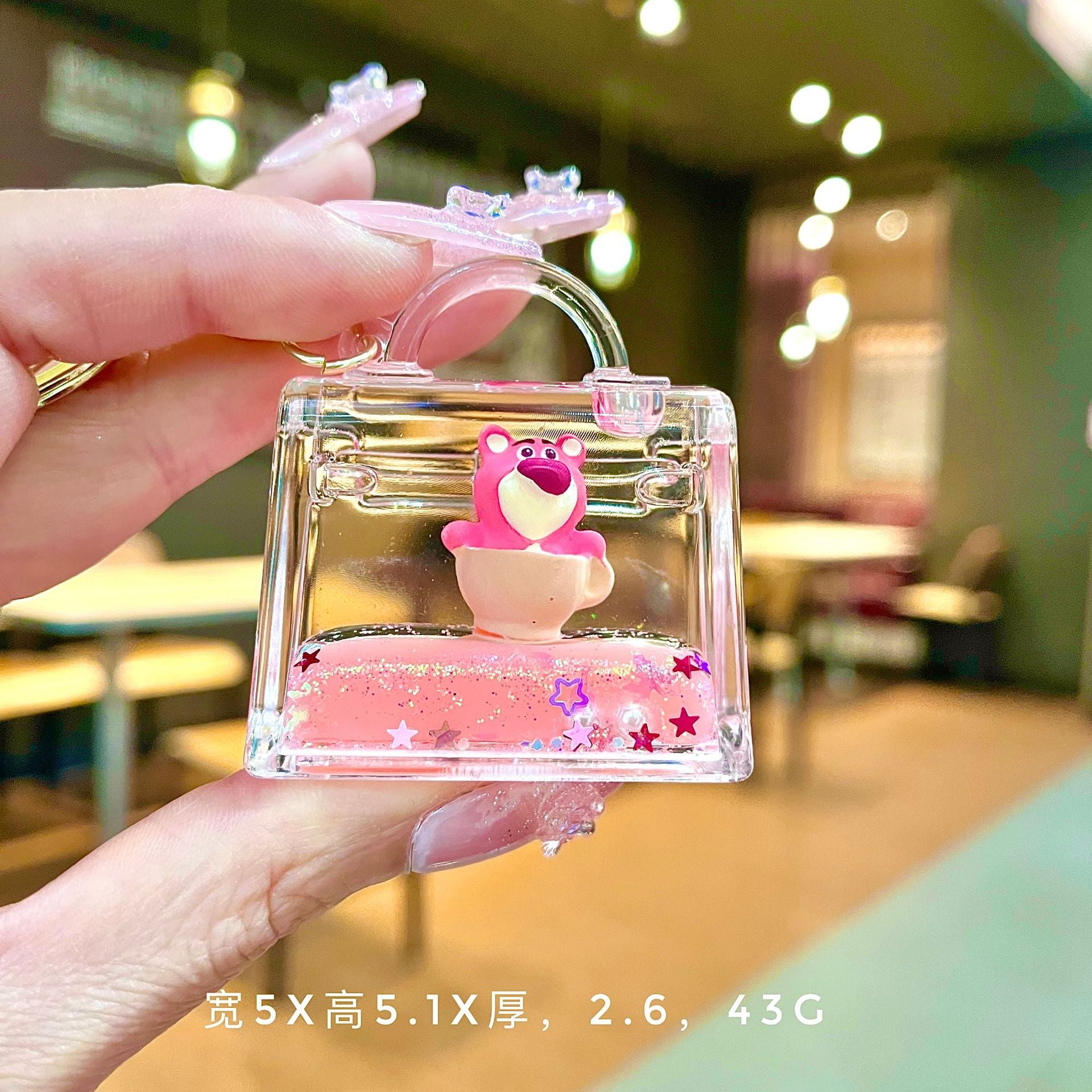 Wholesale Oil filled pink strawberry bear quicksand Keychains