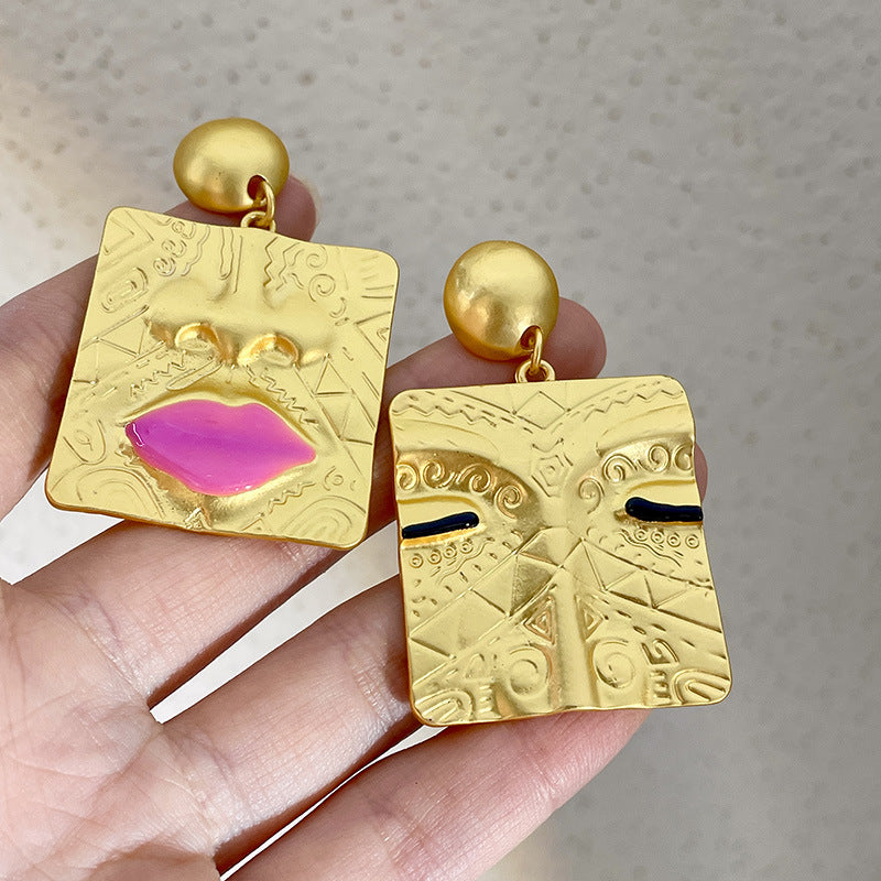 Wholesale Facial Alloy Asymmetric Earrings