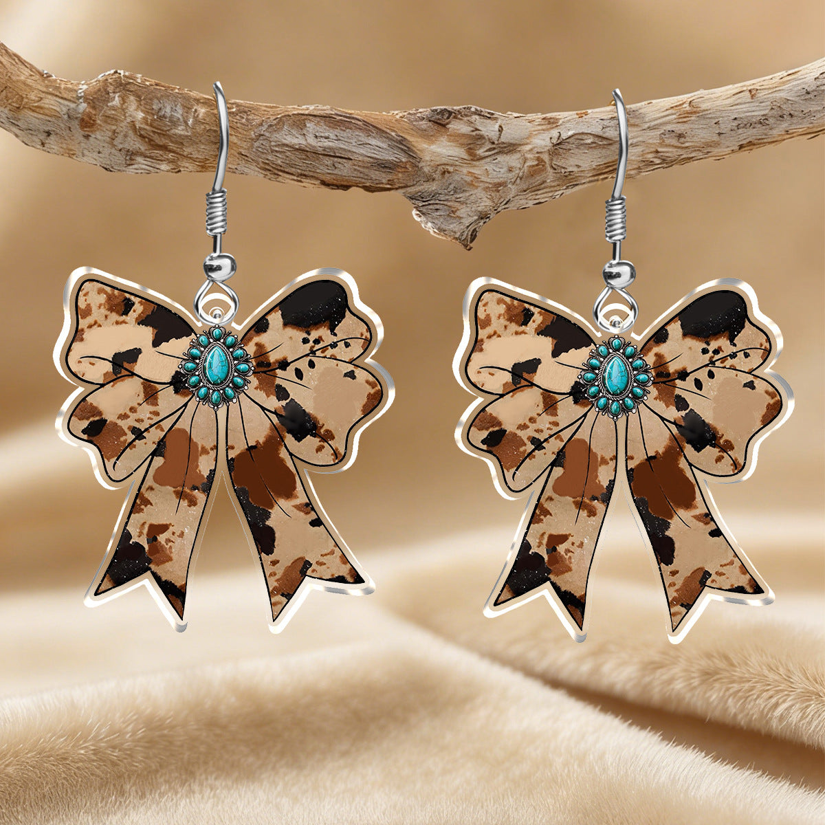 Wholesale Modern Leopard Cow Print Bowknot Acrylic Pendant Earrings For Everyday Party Wear Boutique Resale
