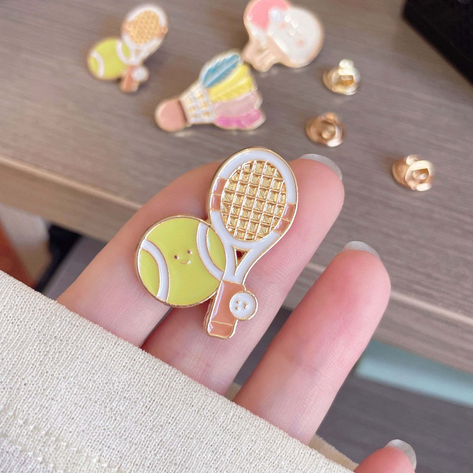 Wholesale Badminton and table tennis brooches are available