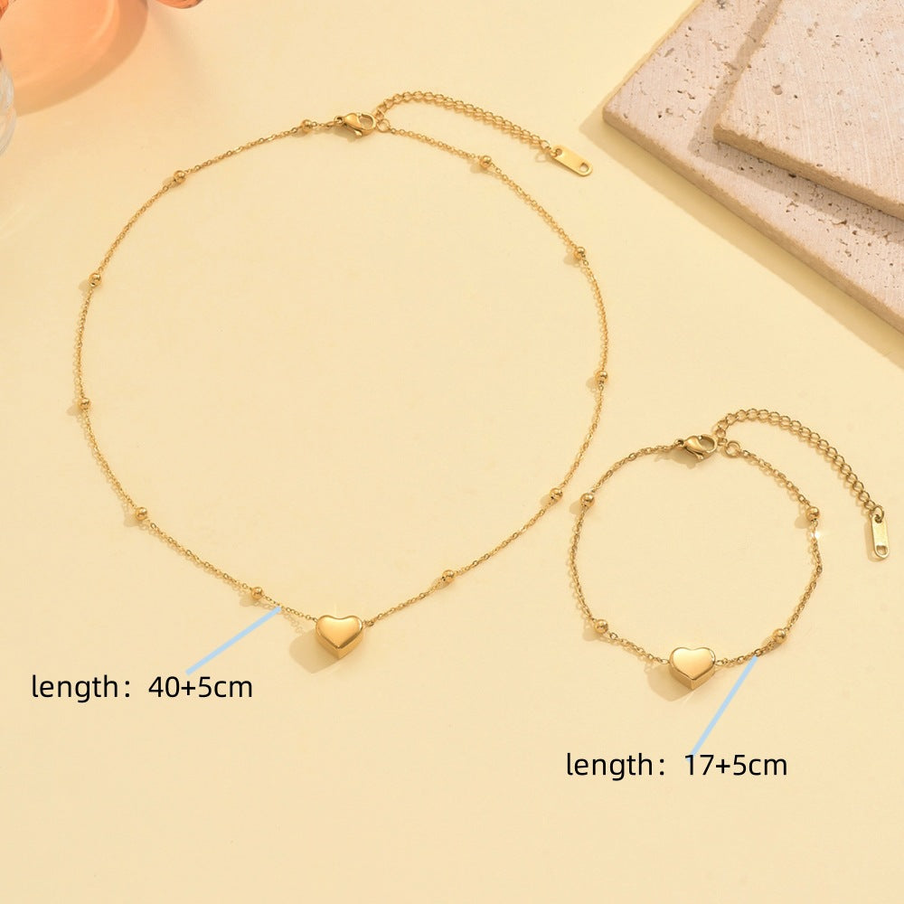 Wholesale Stainless steel gold heart shaped necklace and bracelet