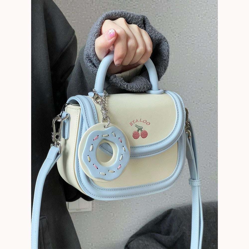 Wholesale Saddle bag Japanese biscuit off-white hand-held shoulder messenger bag