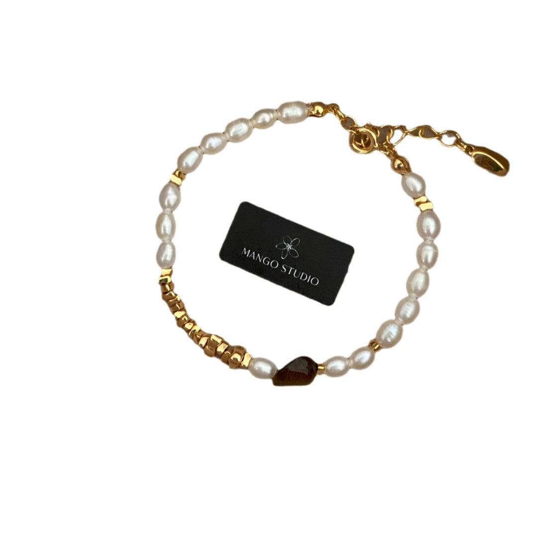 Wholesale Rice-grain pearl tiger eye stone small fresh and high-end adjustable bracelet