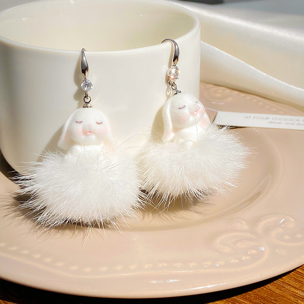 Wholesale Easter hollow asymmetrical white rabbit stainless steel earrings