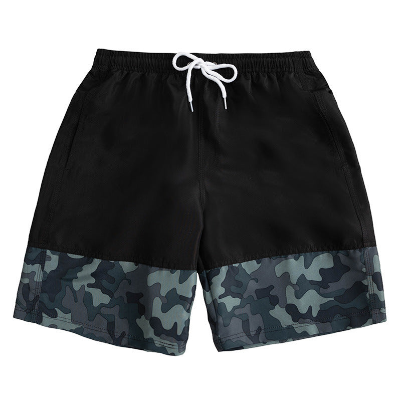 Pantalones cortos de tablero al por mayor los pantalones cortos de tiro sueltos de costura de hombres