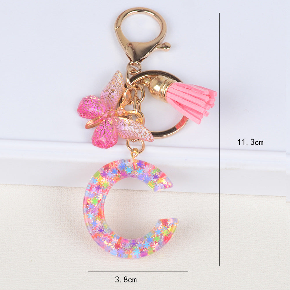 卸売スパンコールスノーフレークレター樹脂キーホルダー