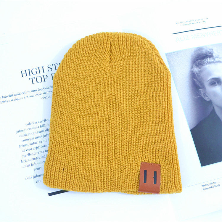 Wholesale Children's Leather Label Warm Ear Protection Knitted Wool Hat