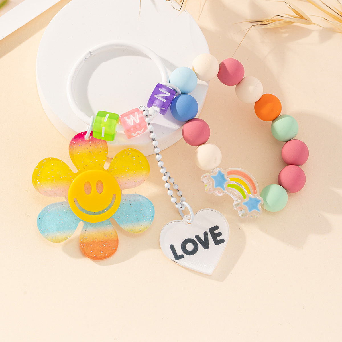 Color de resina al por mayor llavero de flores solar