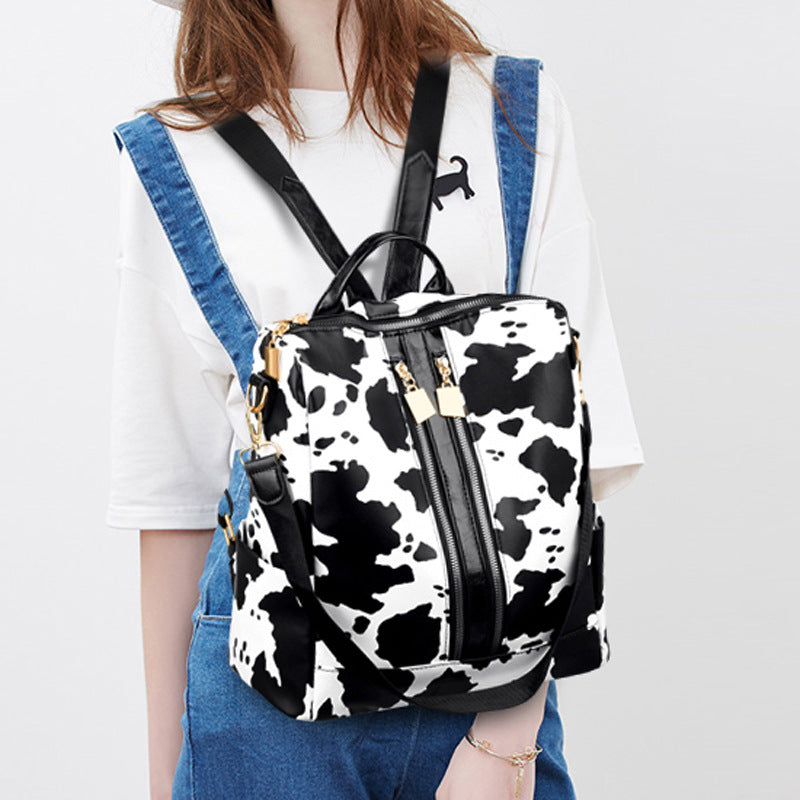 Wholesale Cow Pattern PU Retro Large Capacity Travel Backpack
