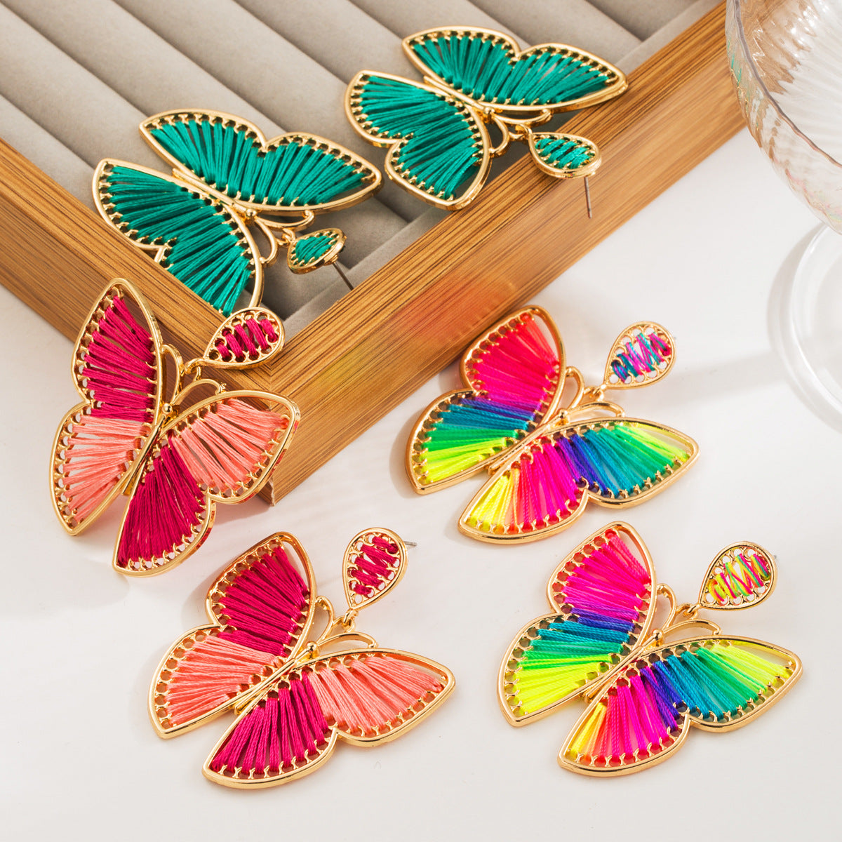 Wholesale Cotton Thread Braided Butterfly Bohemian Ethnic Style Alloy Earrings