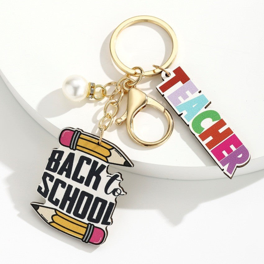 Wholesale Campus style graduation season wooden book keychain