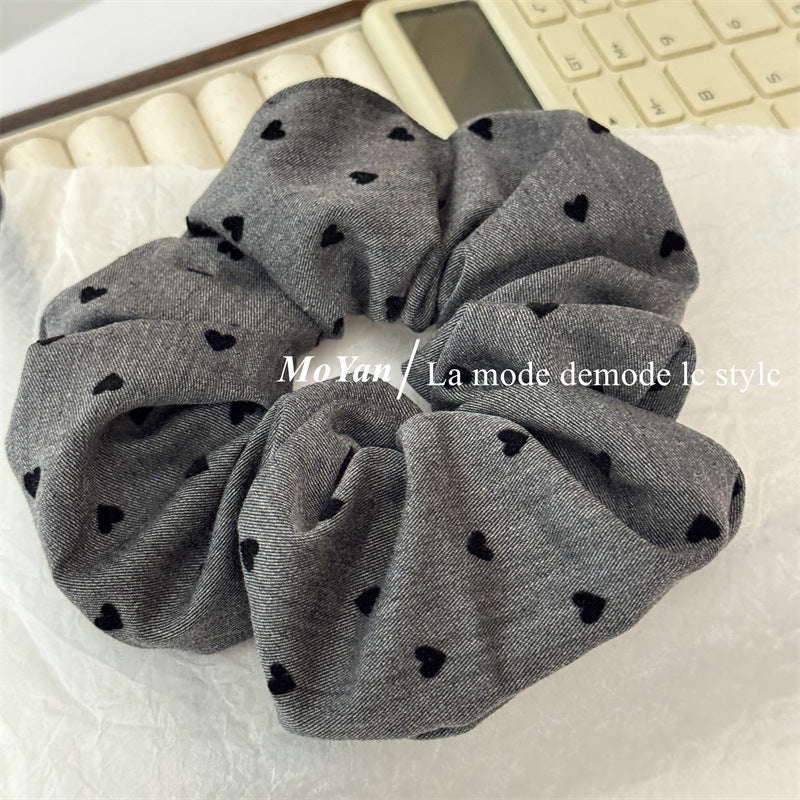 Wholesale Black polka dot bow with heart-shaped elastic headband