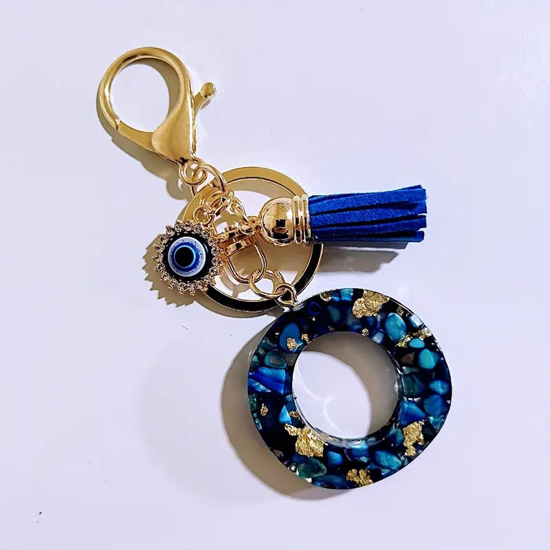 Wholesale Blue English letter Evil Eye tassel keychain