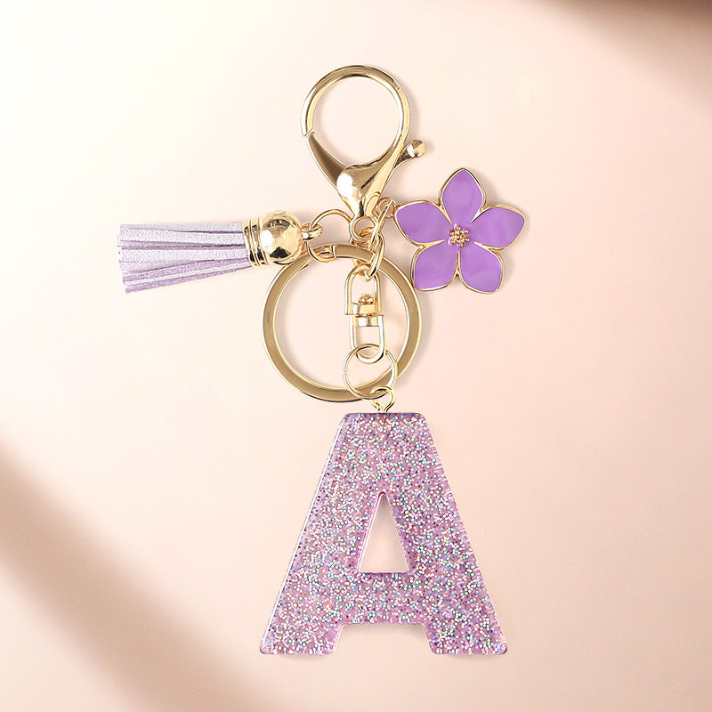 Wholesale Sparkling Pink 26 English Letter Purple Flower Keychain