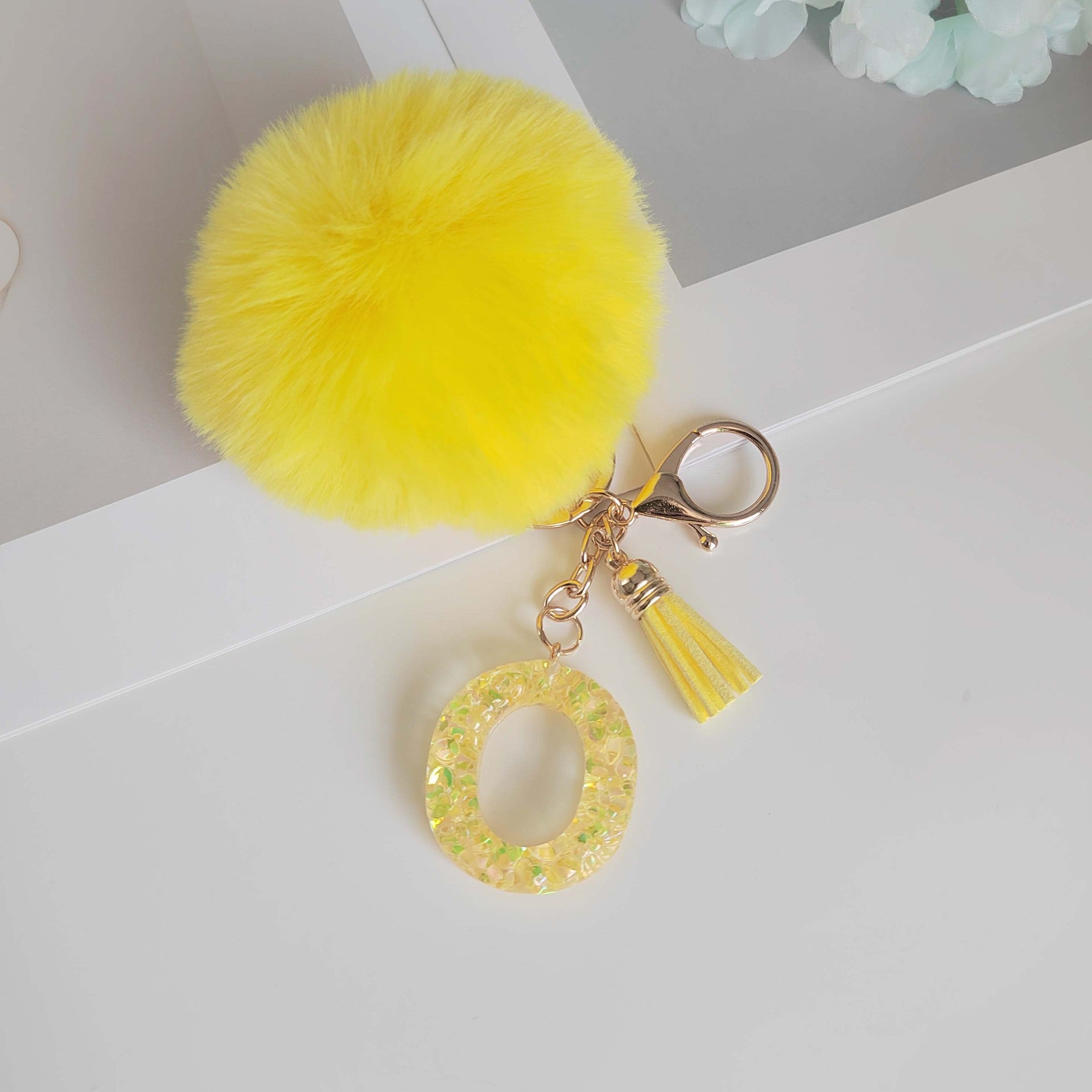 Wholesale Yellow letter ball pendant flower shaped letter keychain