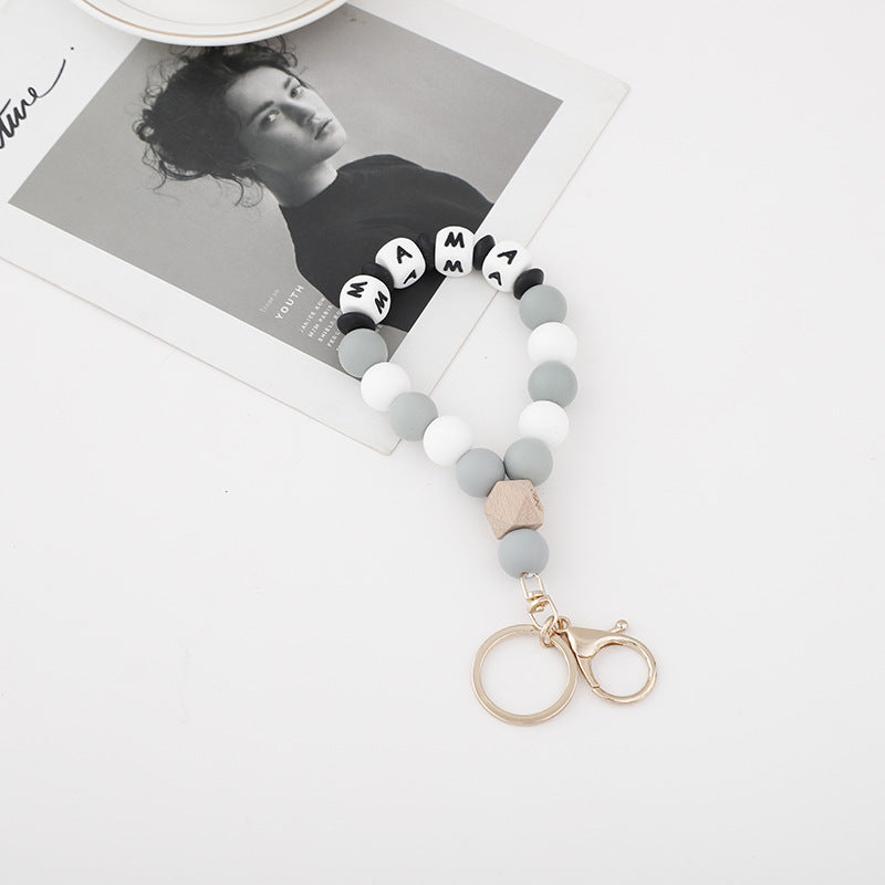 Wholesale 10PCS Square Letter Round Silicone Beads Keychains