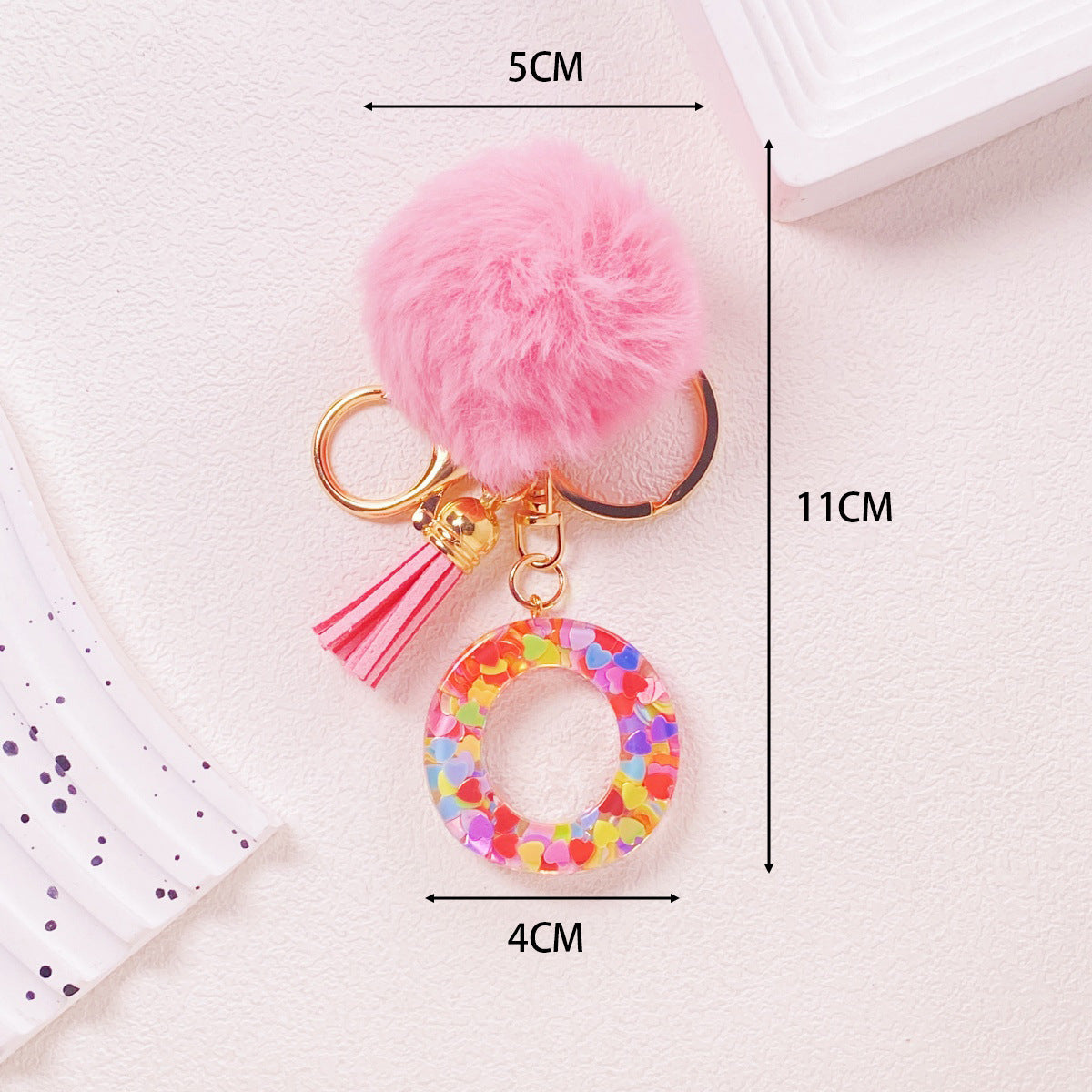 Wholesale Hairball English 26 letter pink Pom Pom keychain