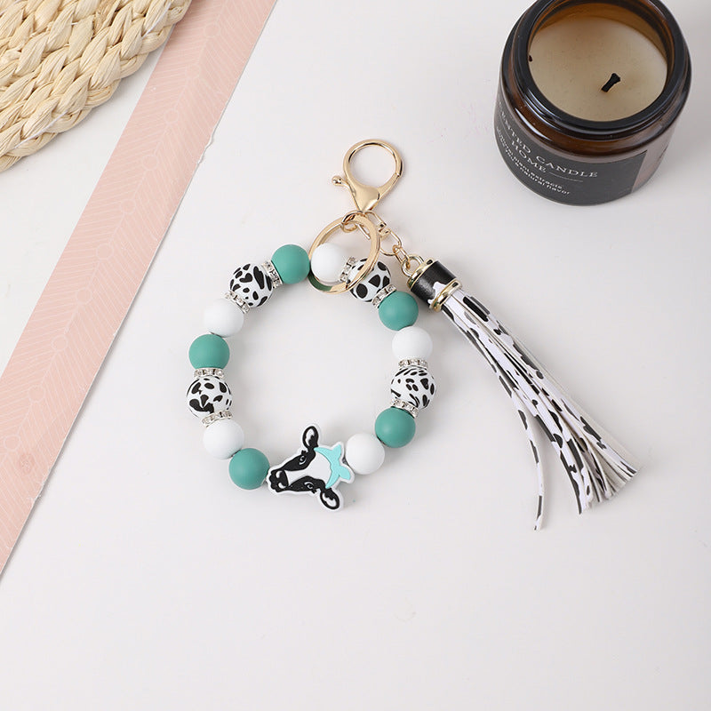 Llavero de muñeca de silicona de borla al por mayor