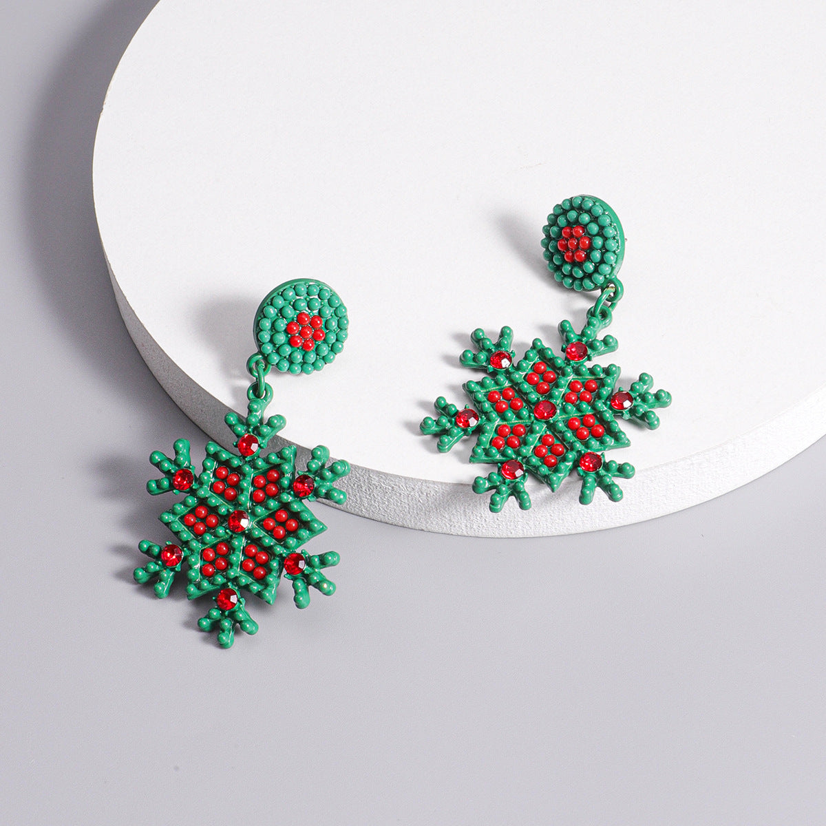 Wholesale Christmas Snowflake Alloy Rice Beads Spray Paint Earrings