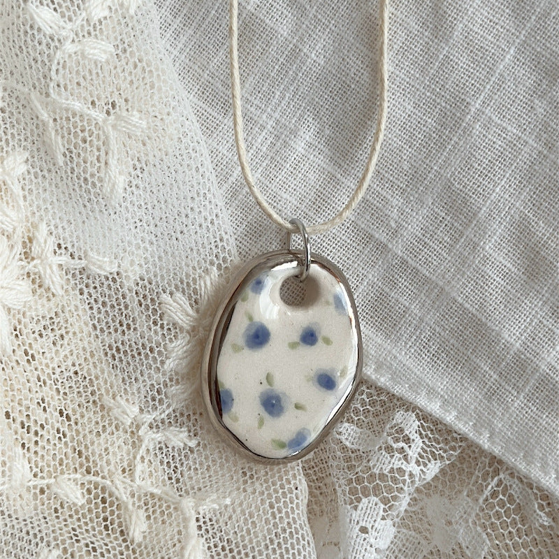 Wholesale rabbit flower print pendant stainless steel necklace