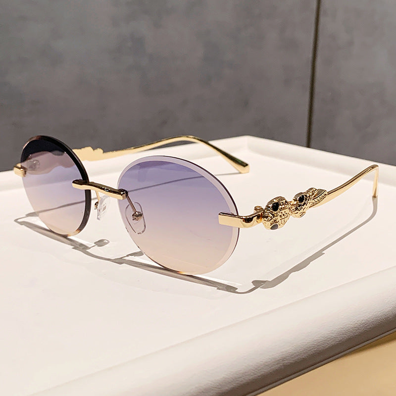 Wholesale Retro oval frameless sunshade sunglasses
