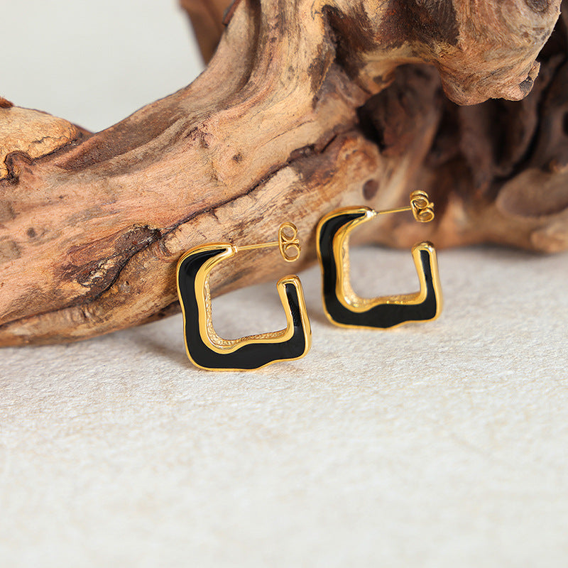 Wholesale Retro Geometric Curved Black Gold Plated Earrings