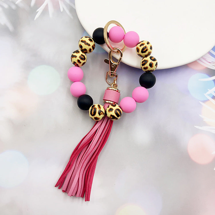 Wholesale Leopard Print Wood Beads Silicone Beaded Bracelet Tassel Key Ring