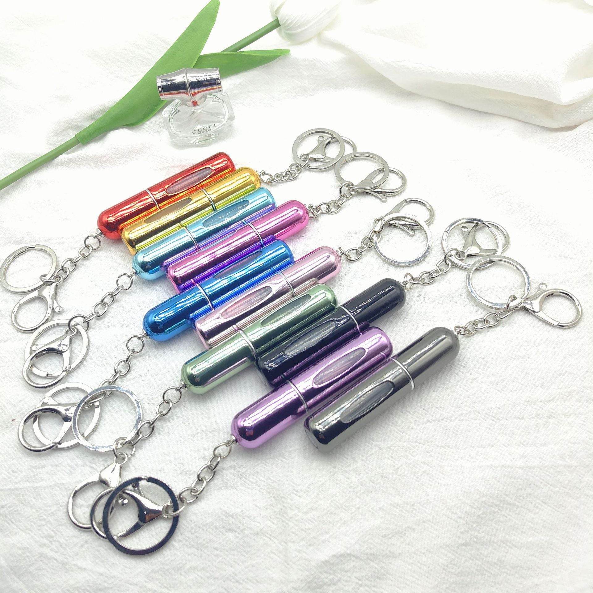 Wholesale bottom filling pump 5ml high color value sample key chain perfume bottle