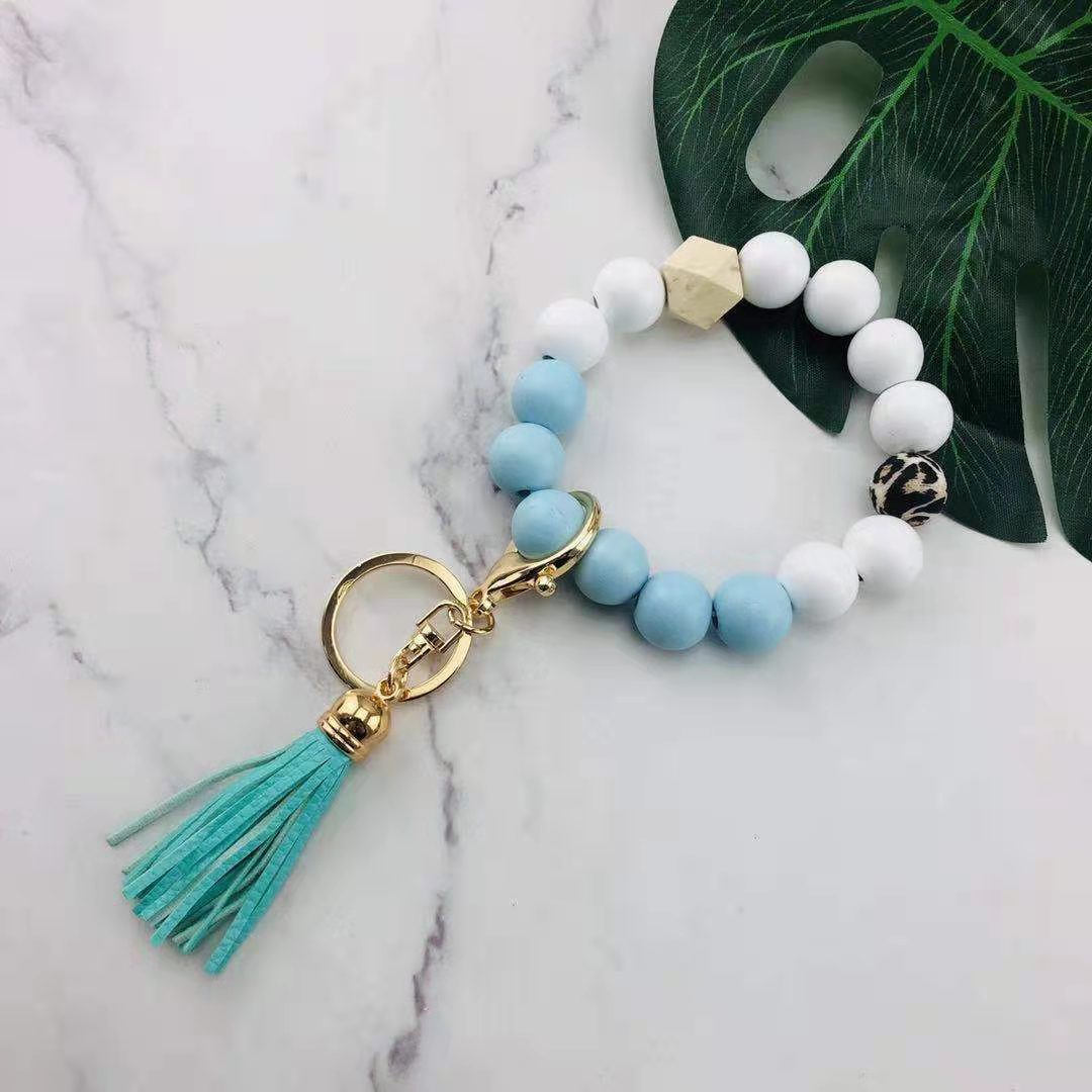 Llavero de muñeca con cuentas de silicona al por mayor