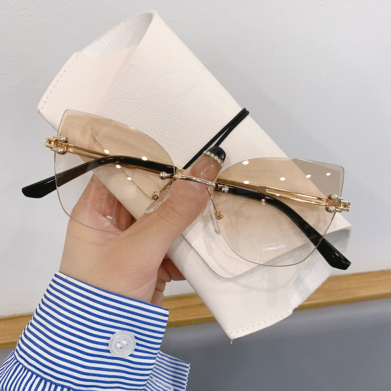 Wholesale Retro frameless cut-edge sunglasses cat-eye gradient sunglasses