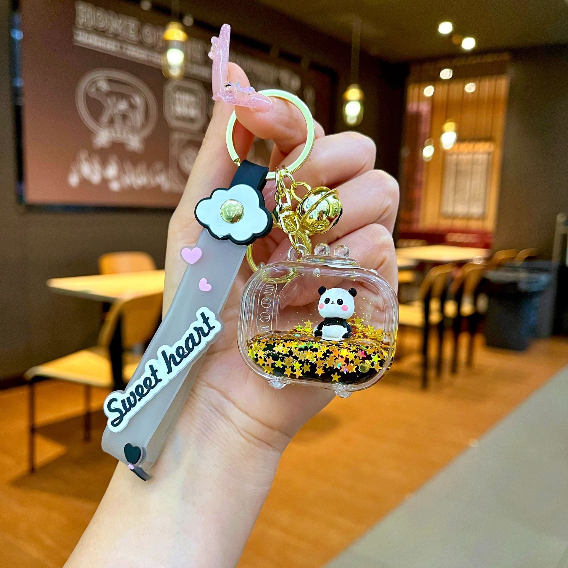 Wholesale Black gold floating cartoon cute panda Liquid Keychains