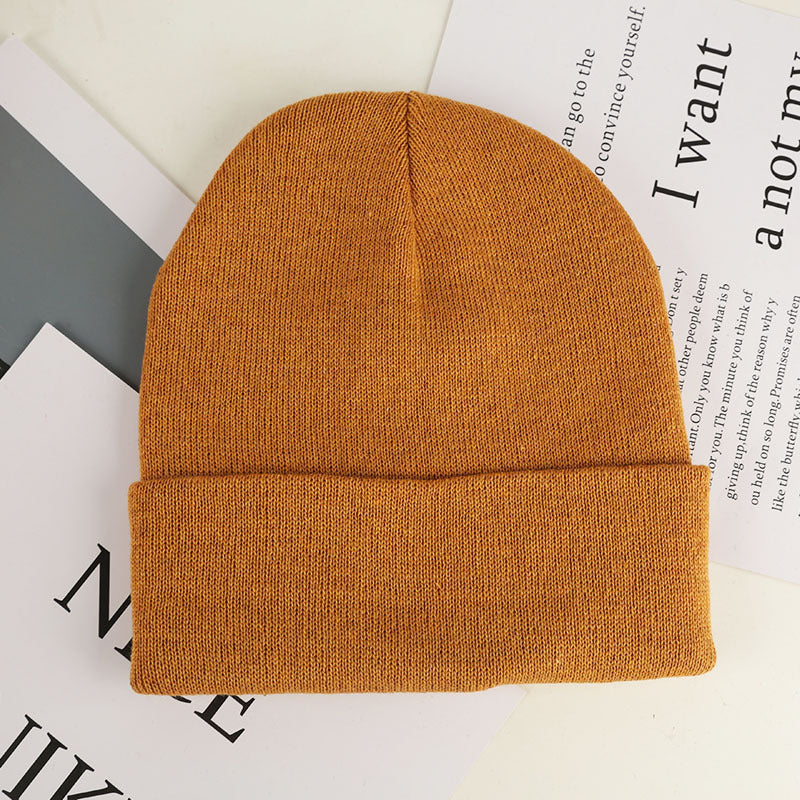 Wholesale Curled-edge Knitted Beanie Solid Multicolor Acrylic Beanie