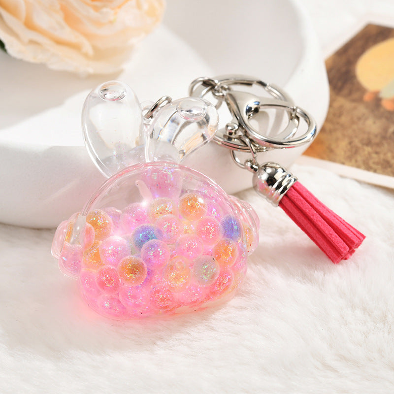Wholesale colorful acrylic oil bottle tassel keychain