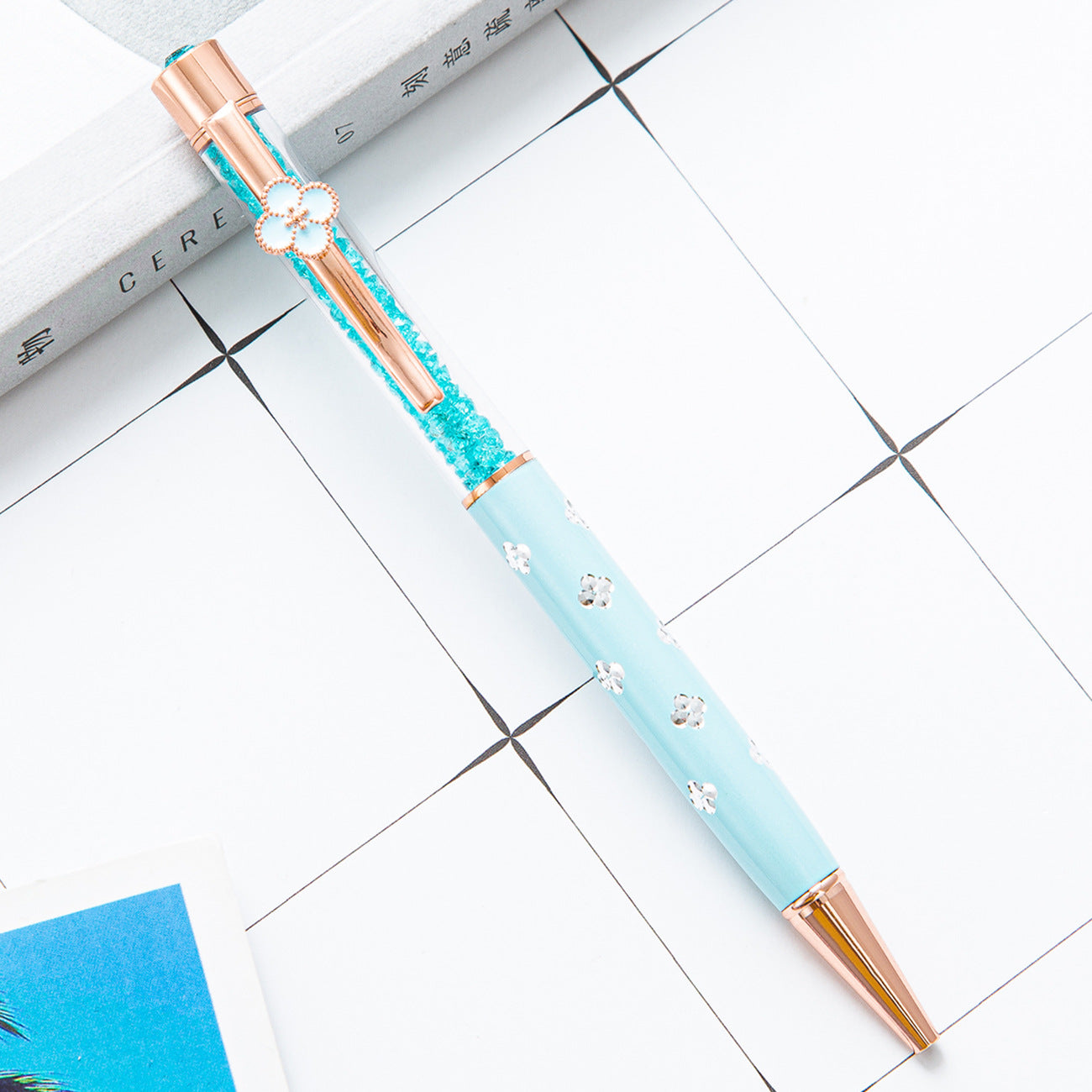 Bolígrafo de cristal de trébol de metal al por mayor