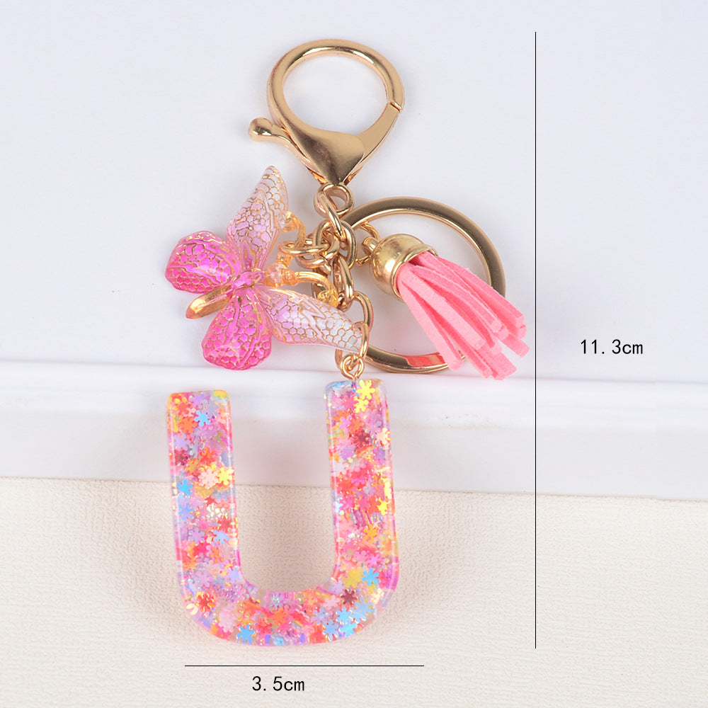 卸売スパンコールスノーフレークレター樹脂キーホルダー
