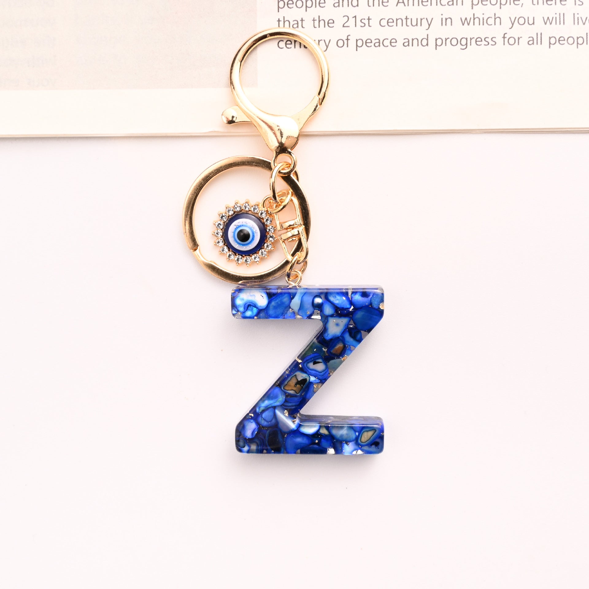 Wholesale Treasure Blue 26 English Letter Devil' s Eye Keychain