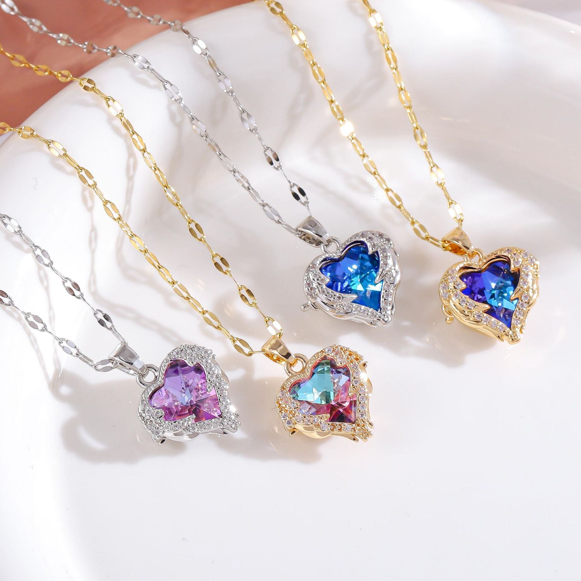 Wholesale titanium steel gold plated silver plated blue crystal ocean heart necklace
