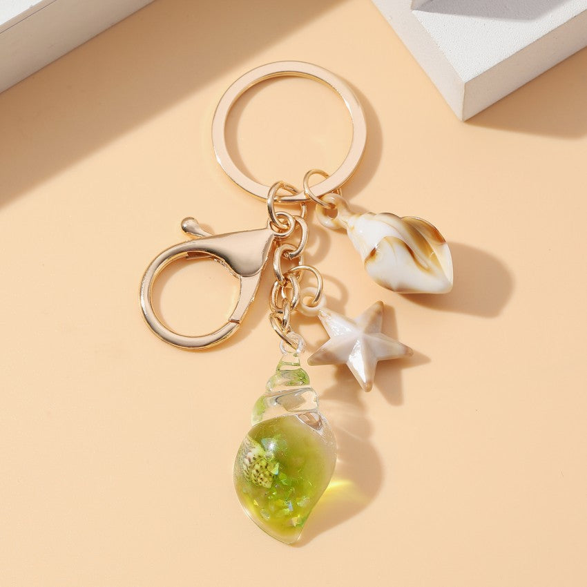 Wholesale Seaside vacation luminous conch Acrylic keychain