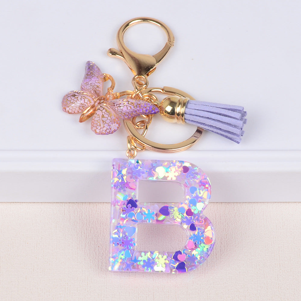 卸売スノーフレークラブスパンコールレター樹脂キーホルダー