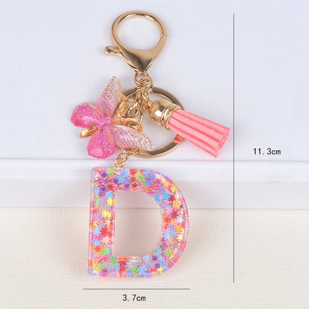 卸売スパンコールスノーフレークレター樹脂キーホルダー