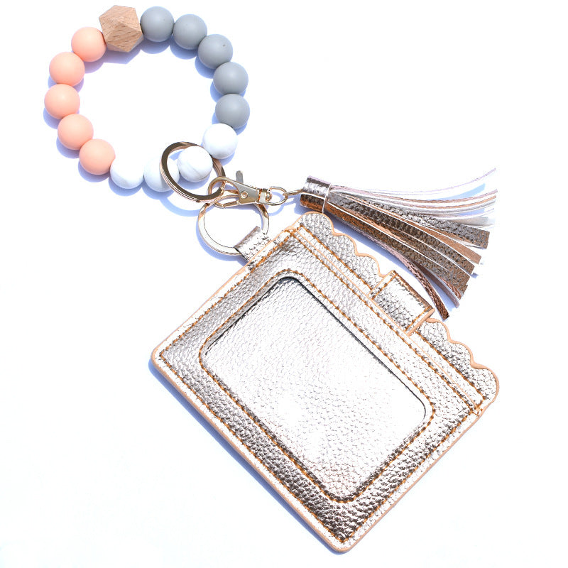 Wholesale Silicone Bead Bracelet Card Holder Tassel Wallet Keychain