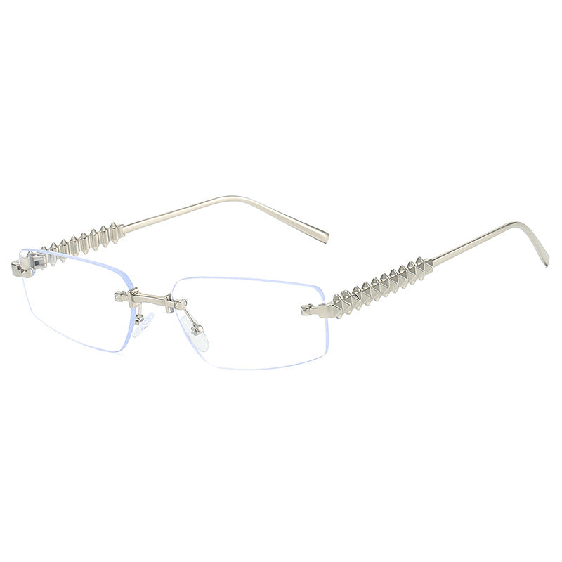 Wholesale New fashion frameless triangle cat-eye cut edge trendy street shooting retro versatile sunglasses