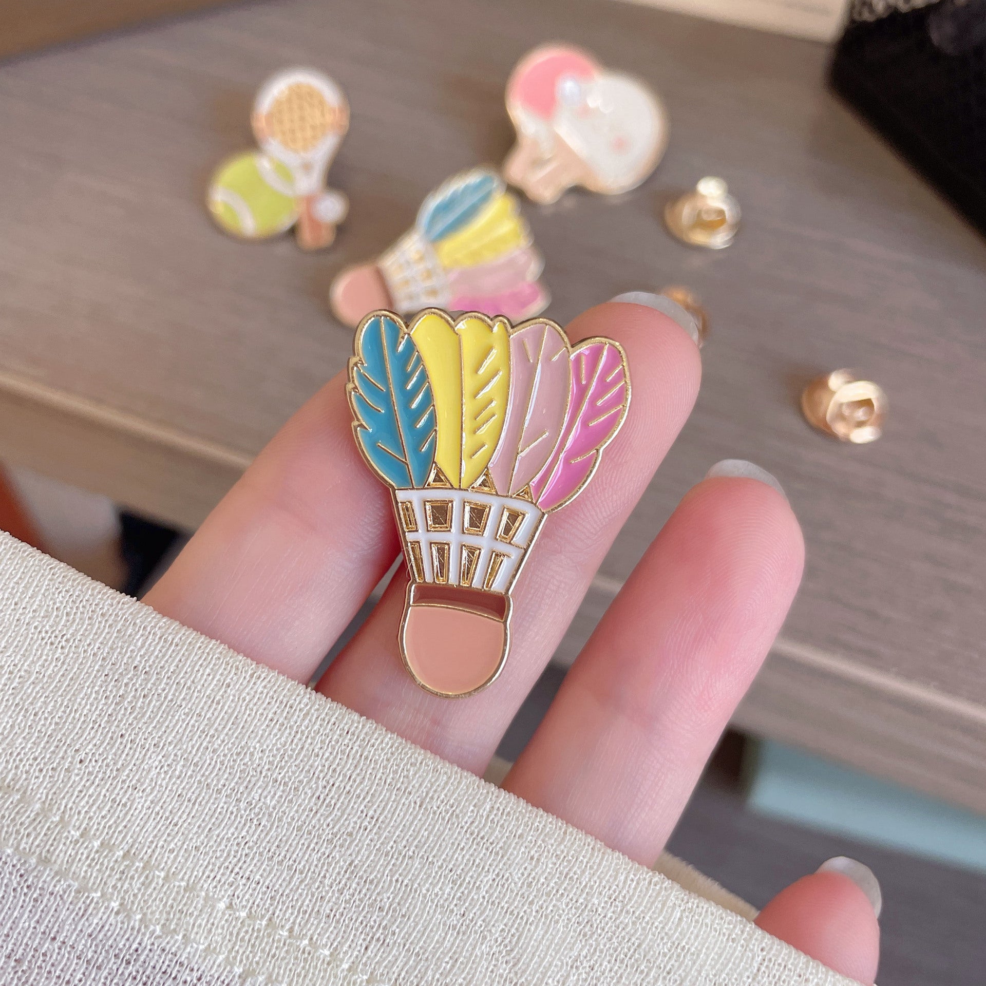 Wholesale Badminton and table tennis brooches are available