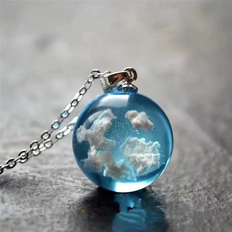 Wholesale blue sky white clouds Mori transparent spherical resin pendant European and American style creative necklace