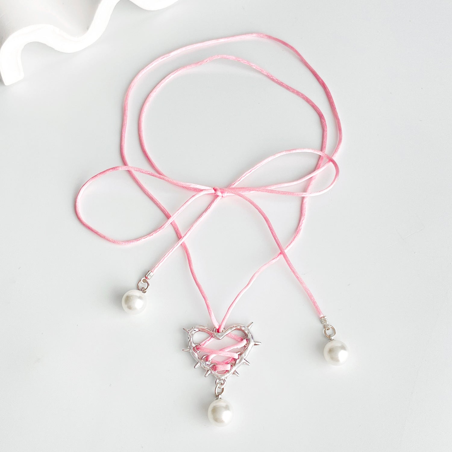 Wholesale Thorn Heart Wrapped Ribbon Pearl Pendant Necklace